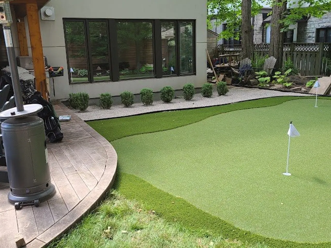 Backyard artificial-turf putting green in Richmond by ALM Construction